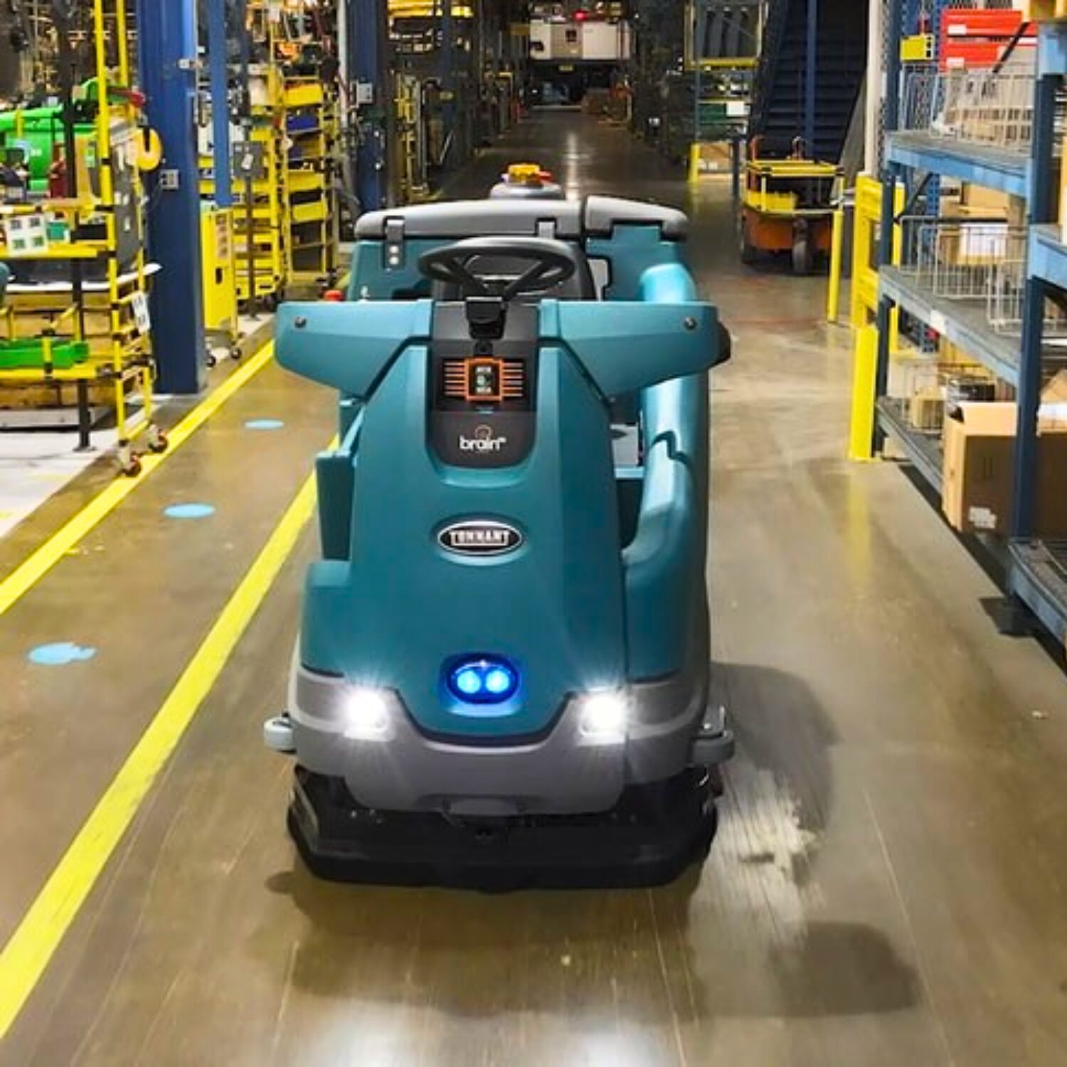 Tennant T16AMR floor cleaning robot in a warehouse