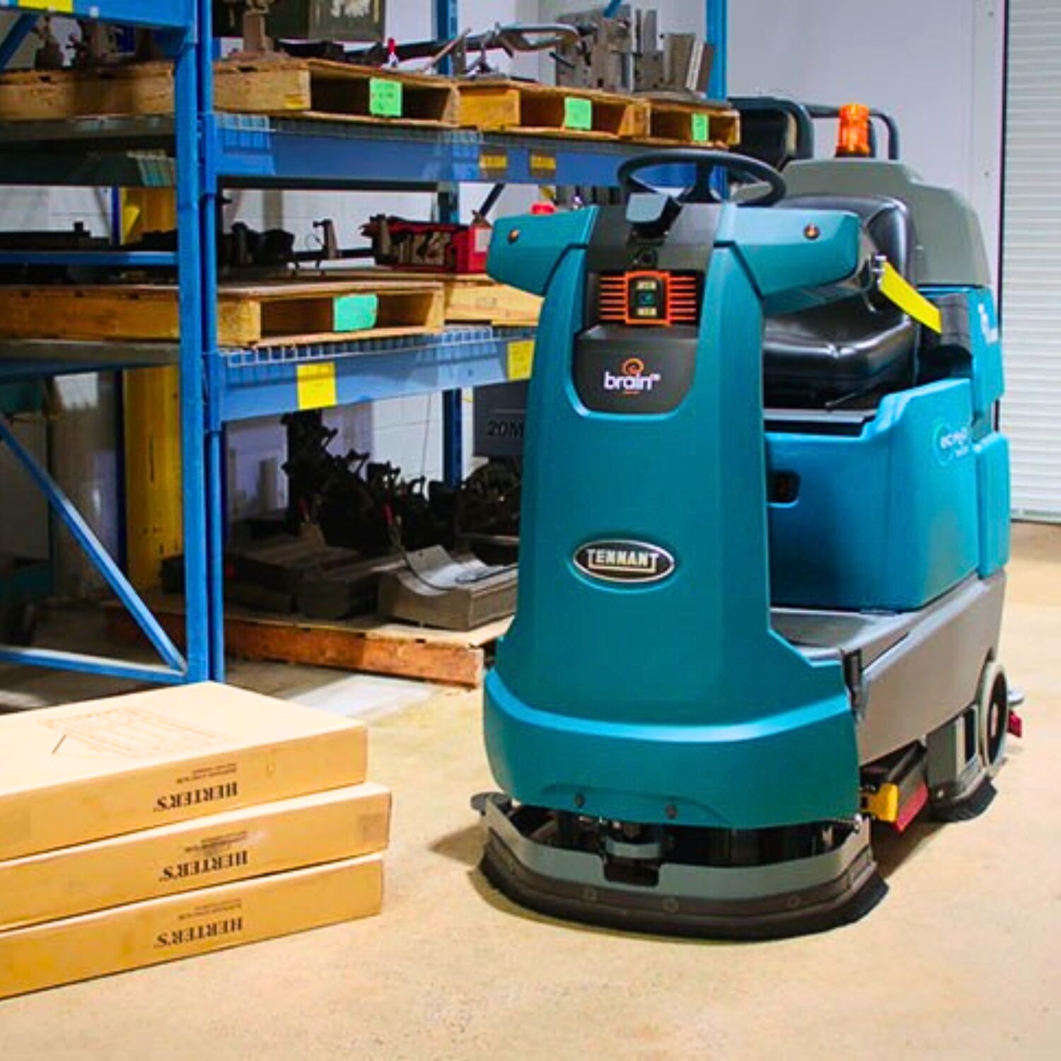 Tennant T7AMR robotic floor cleaner cleaning a warehouse.